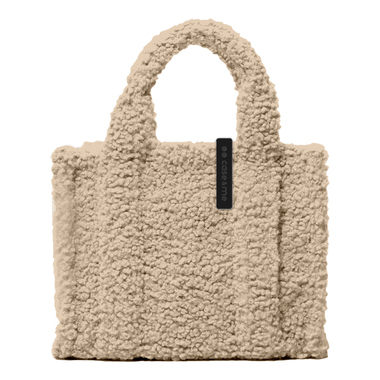 Thanks to its woolly finish, this bag will keep your devices warm and help you stand out wherever you go